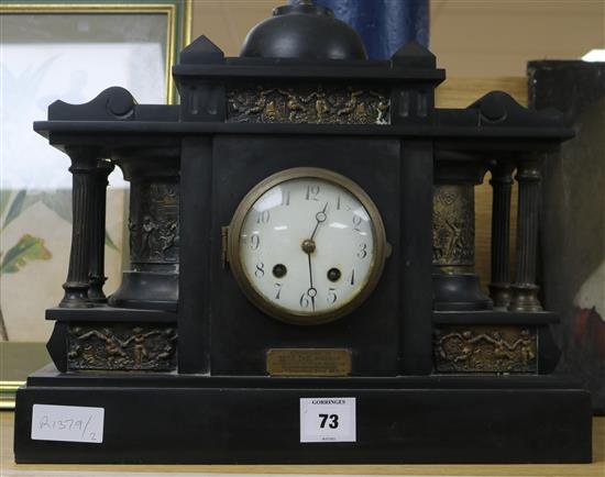 A black slate ornate classical clock